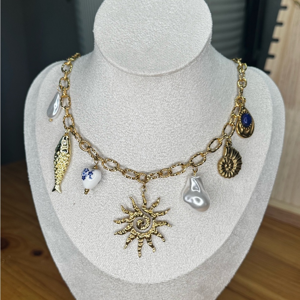 Gold Charm Necklace with Sun and Fish Pendants